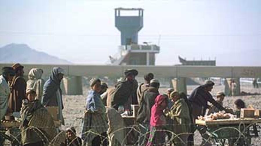 Refugees at the Chaman border crossing, closed by Pakistan over the weekend.