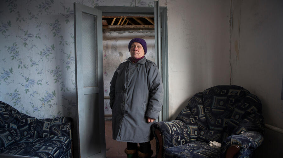 In divided Ukraine, for many along division line, cold is also an enemy