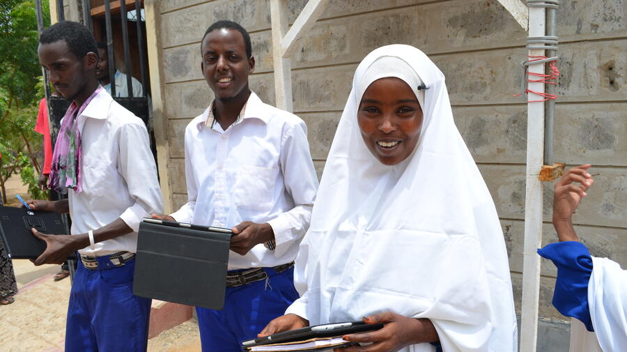 Kenya. Students using tablets in Nasib secondary school