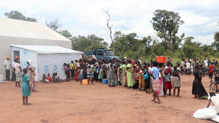 Angola. Parents waiting for the screening of their children