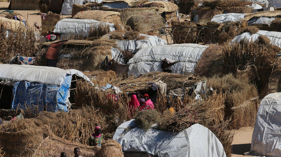 Nigeria. Thatched homes at the Muna Internally displace peoples camp in Maiduguri, Nigeria