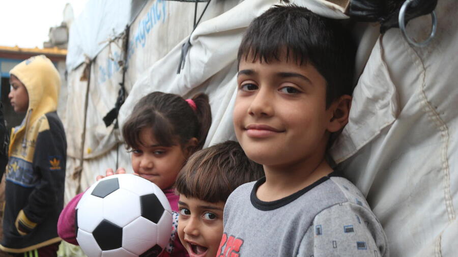 Iraq. Displaced family given shelter on return to damaged village