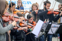Refugee Children Play Music for Integration