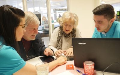 Young refugees teach IT skills to seniors in Sweden