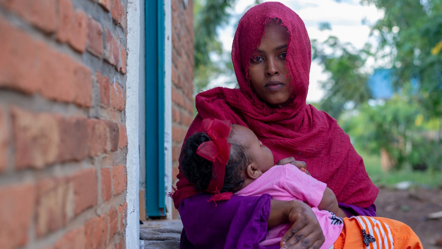Rwanda. Young refugee mother returns from Libya in search of safety once more
