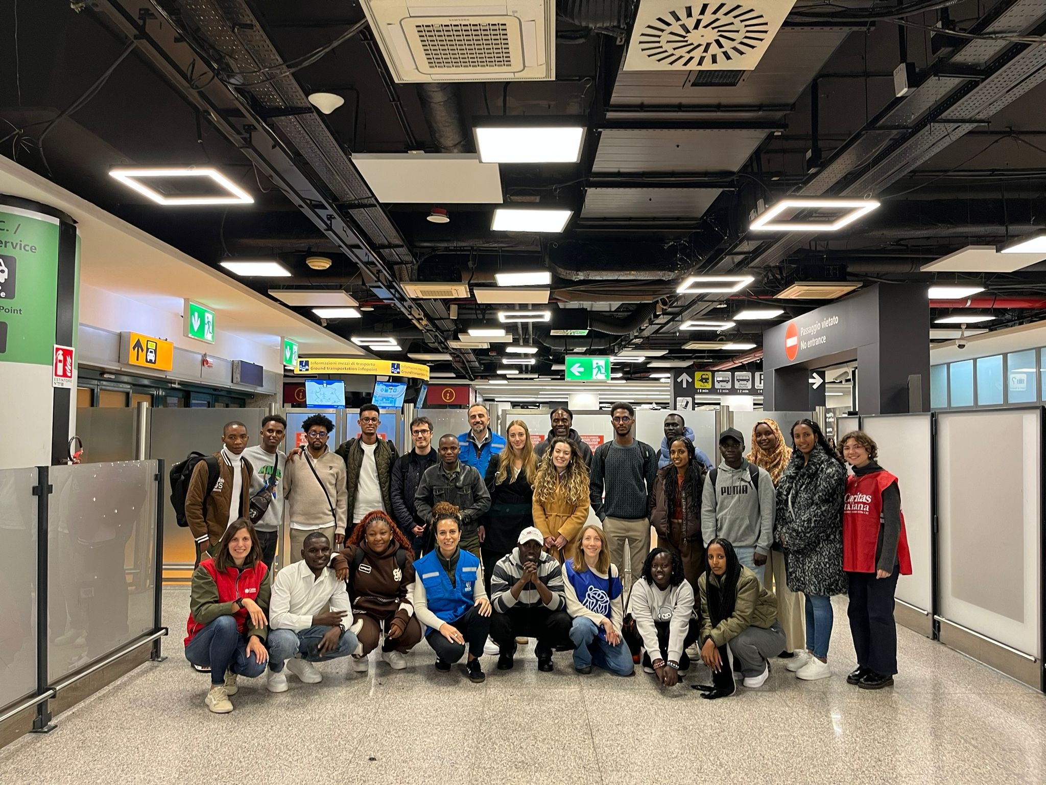 A proud moment as Sandra joins fellow students arriving in Italy to pursue higher education.