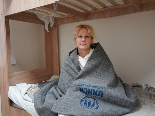 Ukraine. UNHCR supports internally displaced families with cash assistance and relief items