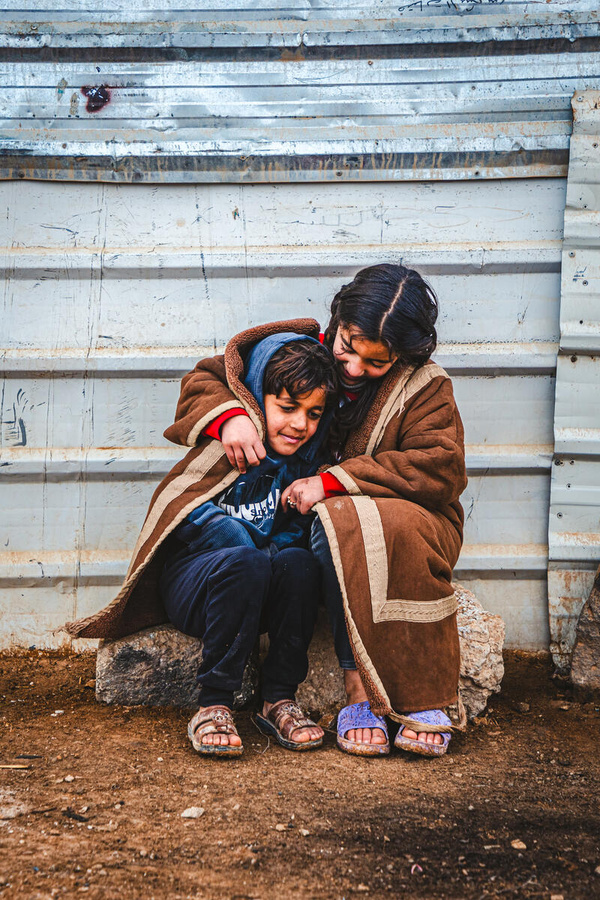 Jordan. Smiling Through the Harsh Winter in Zaatari camp.