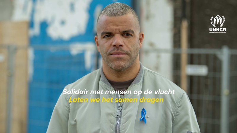 Sef draagt het solidariteitslintje