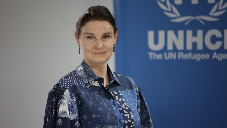 A person in a blue shirt