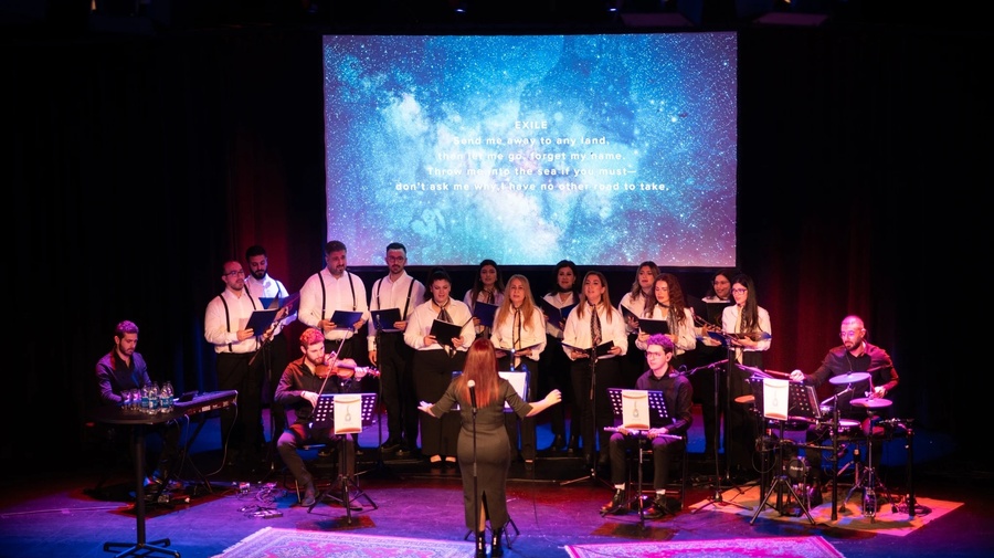Glädjekören, a choir formed of people with refugee backgrounds perform a song about exile ©Ivanna Stytsun