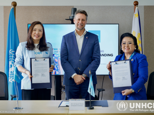 United Nations Resident Coordinator in the Philippines Arnaud Peral (centre) joins UNICEF Representative Kyungsun Kim and UNHCR Philippines Head of National Office Maria Ermina Valdeavilla-Gallardo at the signing of an agreement to deepen joint action on birth registration and ending childhood statelessness. 