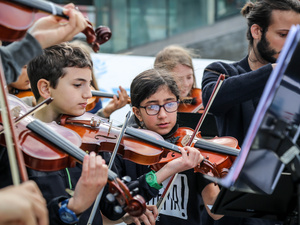 Sweden. Refugee and asylum-seeking children play music for integration