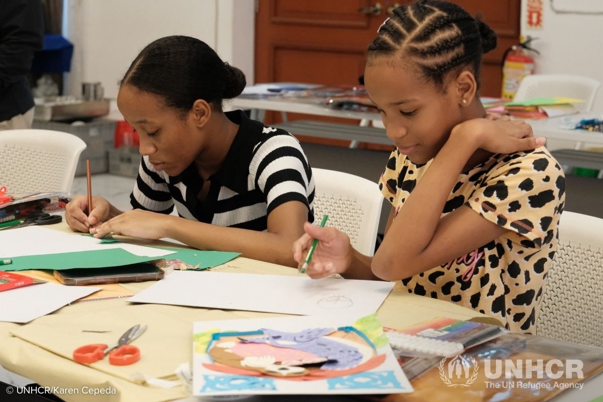 Young sisters work on their art pieces