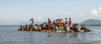 Home-made rafts arriving from Myanmar, refugee population density soaring