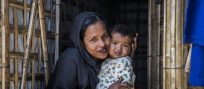 New shelter eases monsoon threat for young Rohingya family
