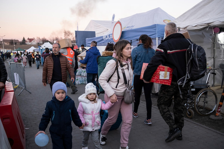 Refugees after crossing the Medyka border from Ukraine into Poland