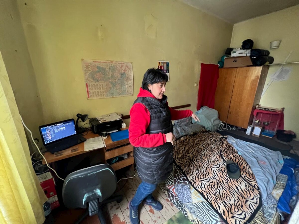 Rymma Mytrak, 35, runs a hostel she set up for displaced Ukrainians from a small office where her family also sleeps