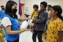 Unregistered children and their families in Maguindanao receive their birth certificates