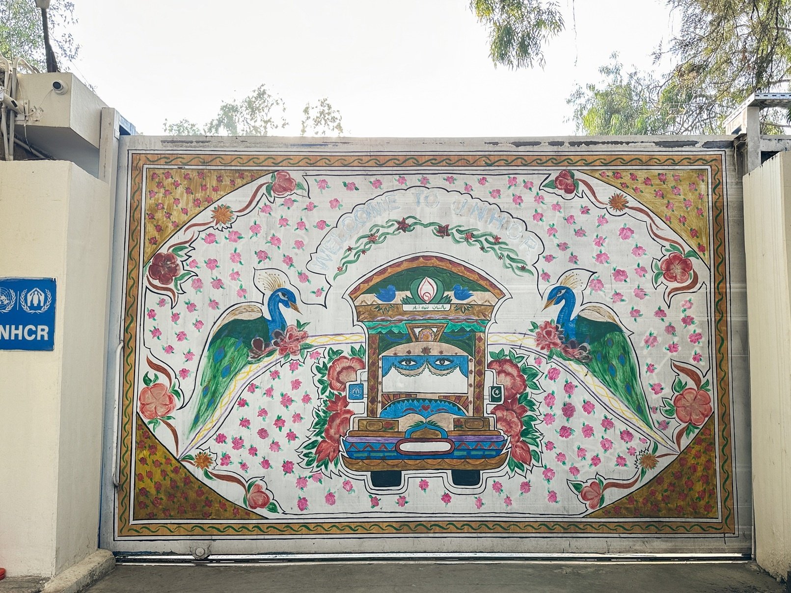 Art mural at UNHCR Pakistan office entrance painted by Sumaiya. 