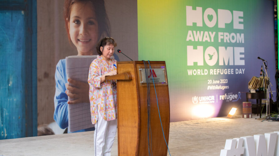 Ms. Noriko Yoshida delivering a message