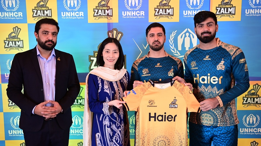 UNHCR's Deputy Representative, Ms. Fumiko Kashiwa, and Peshawar Zalmi's COO, Mr. Mian Abbas Layaq, officially announce the partnership at Serena Hotel in Islamabad, with Peshawar Zalmi's star cricketers Mr. Hussain Talat and Mr. Najibullah Zadran also present.