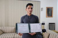 Government, UNHCR pay tribute to refugee student for earning distinction
