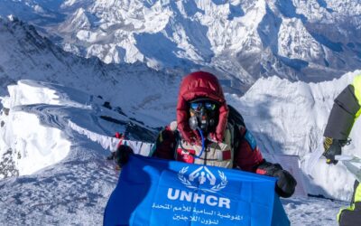 Sheikha Asma Al-Thani raises UNHCR flag on highest peak on earth