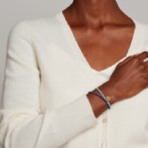 Woman wearing the WithRefugees bracelet