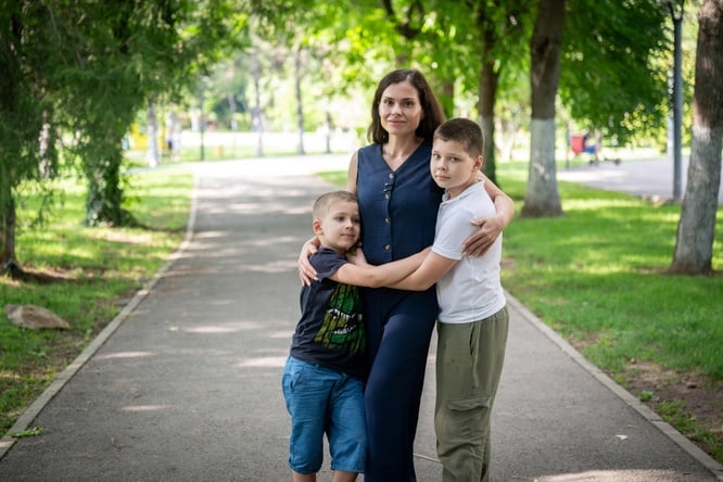a woman and her two sons