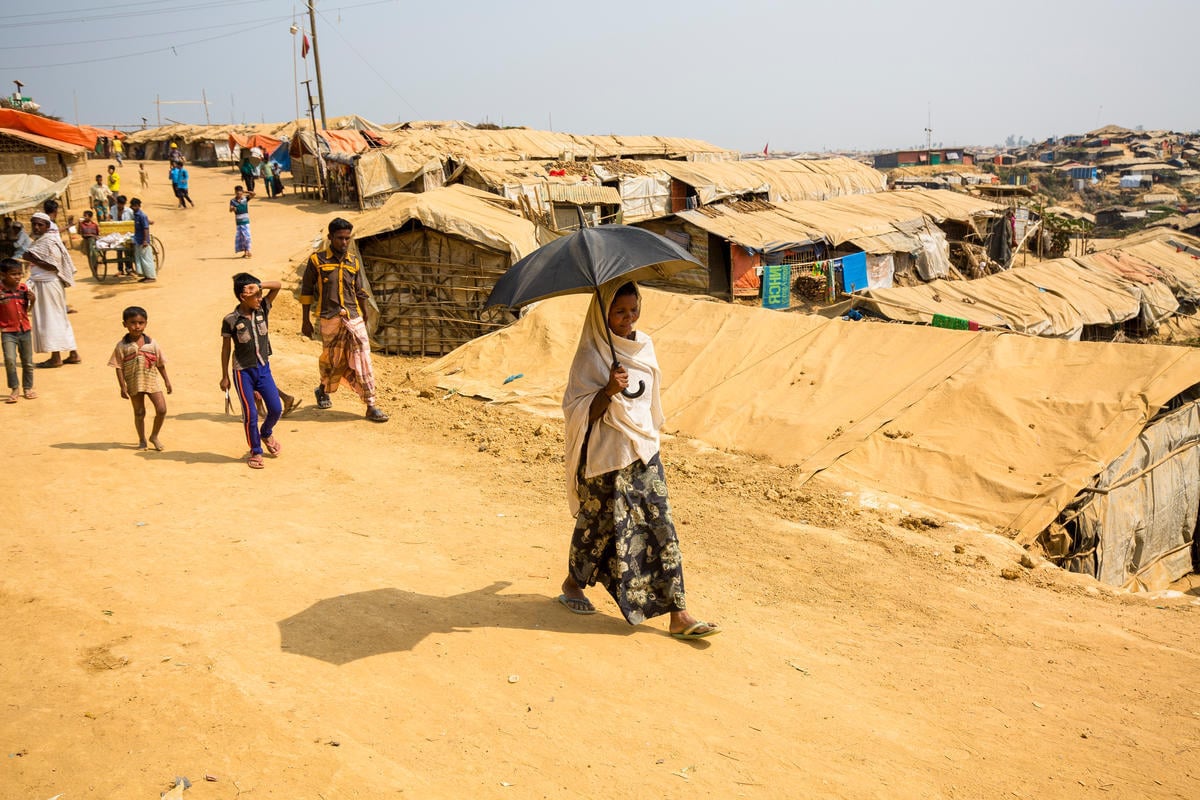 Bangladesh. Female head of households recieve assistance from Community Outreach Volunteers