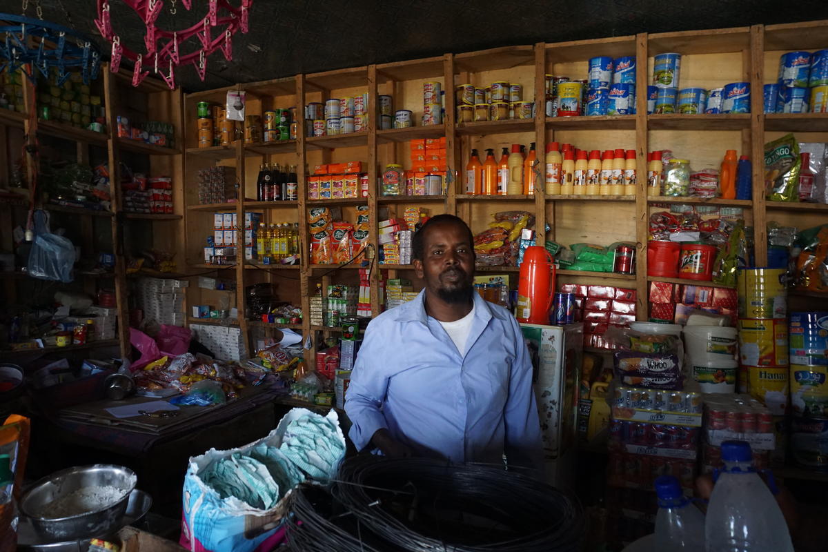 Ethiopia. Host community shop owner enjoys increase of business due to CBI interventions