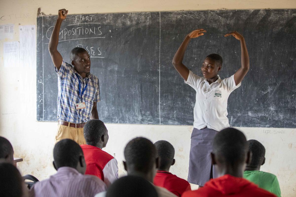South Sudan. Parents build new classrooms for overcrowded refugee school