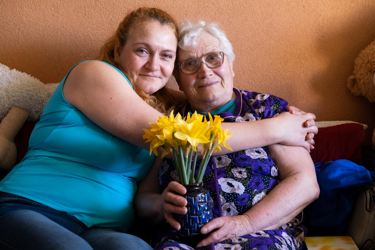 They will use the cash assistance to buy Luba some crutches and other medical items. © UNHCR/Maciej Moskwa