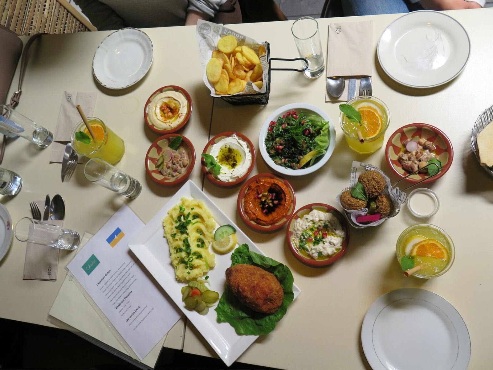 Dishes on the menu a © UNHCR/Frederik Bordon