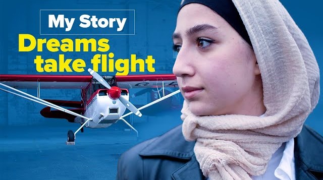 Maya Ghazal next to a plane. Text reads: &quot;My story: Dreams take flight&quot;.