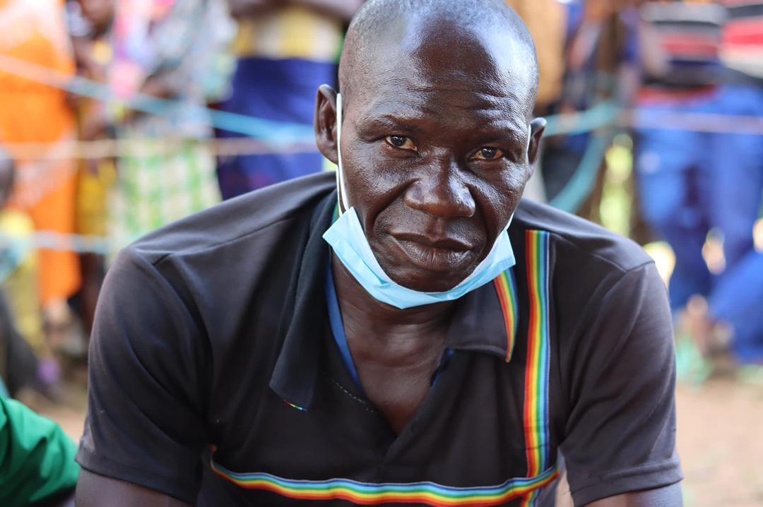A Central African Refugee looks at the camera.