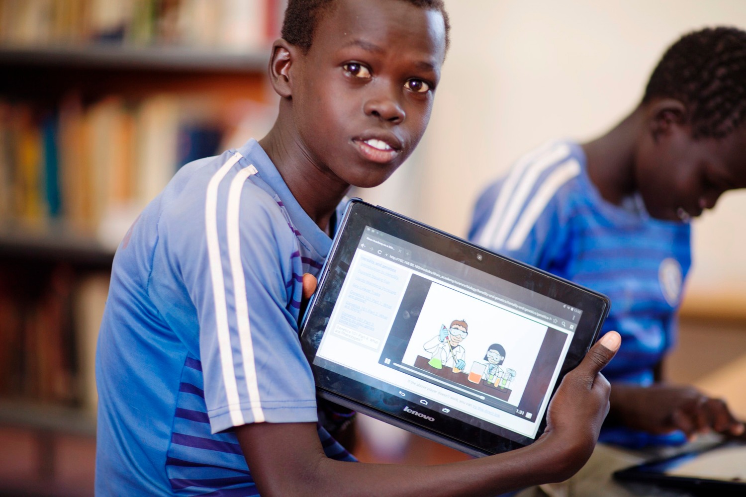 Kenya. Refugees using tablets from the Instant Network Schools project