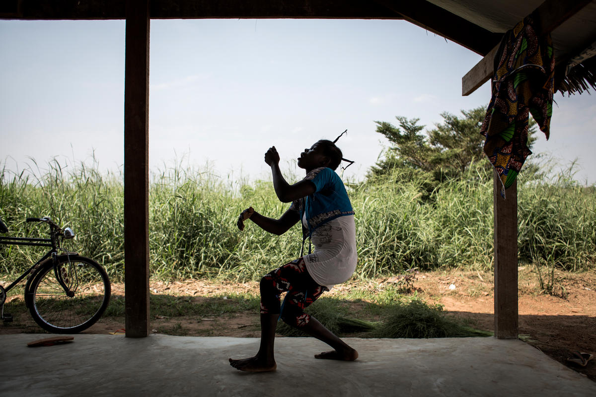 Democratic Republic of Congo. A Central African Refugee takes part in a theatre dance class in the Inke Refugee Camp.