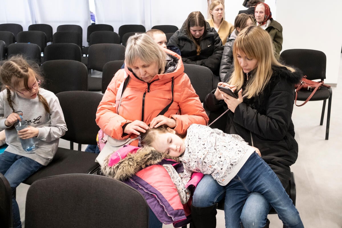 Poland. Refugees from Ukraine wait to register for cash assistance in Warsaw