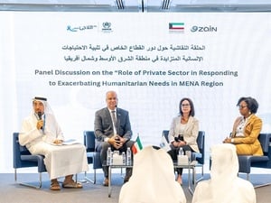 جانب من الفعالية الخاصة لإحياء يوم اللاجئ العالمي في الكويت.