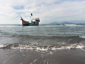 A refugee boat in the ocean