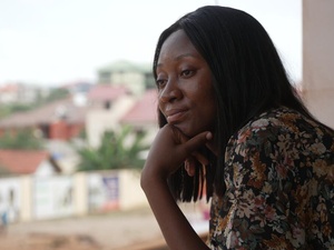 Ghana. Louange Koffi, a refugee nurse at a clinic she volunteers in Accra