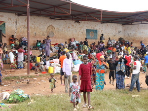 Families take shelter in a school