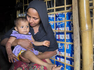 Bangladesh. Rohingya woman took shelter in her relative's home after losing everything in a recent fire at Kutupalong refugee settlement.