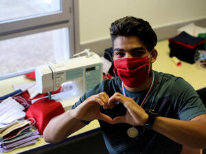 France. Young Afghan makes hundreds of masks to protect village from COVID-19