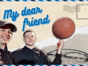 My dear friend: Two smiling boys playing basketball
