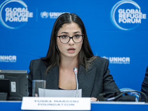 Yusra Mardini speaks at the High-Level Event.