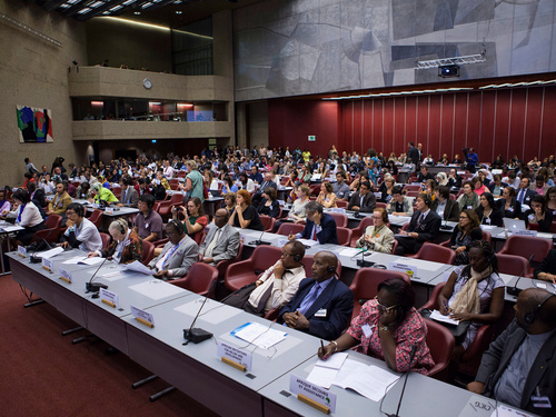 A room in a conference center full of people