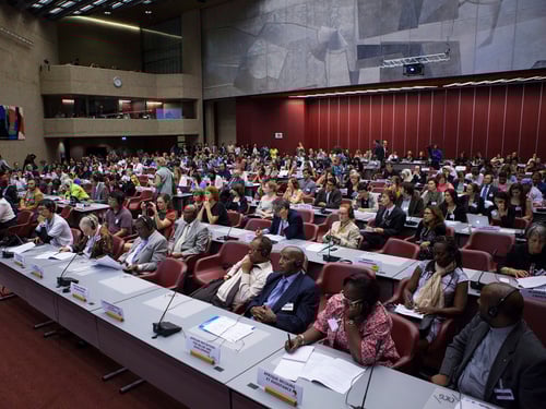 A room in a conference center full of people